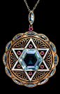 Art Deco Star of David Aquamarine Pendant.  An original pre World War II Art Deco pendant designed as a round openwork matte gold plaque with a white enamel six pointed Star of David set with a hexagonal aquamarine and six small rubies. The star is flanke