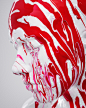 Drips : Paint dripping over models, creating fine art studies mixing bold red and stark white. 