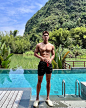 Photo by 朱宦霖Peter Zhu on May 12, 2023. May be an image of 1 person, biceps, body building, sarong, pool and outdoors.