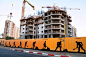 'Men at Work' by Maya Barkai: Installation in Bat Yam of life-size working man figures ring two construction projects. #Maya_Barkai #Working_Man #Bat_Yam