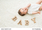 Baby and letter