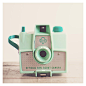 mint green camera photograph, vintage camera photograph, retro, savoy, pastel, girl scout camera, color photography, still life photograph