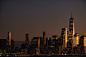 city skyline during night time