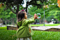 selective photo of a girl holding bubbles photo – Free People Image on Unsplash