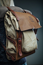 finelly organized backpack with few rollup pockets. canvas bag in a leather harness.: 