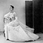 Patricia in Jacques Fath's exquisite white tulle evening gown called 'Sandrine' with silver embroidery by Lesage
