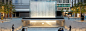 apple's sunken milan store is entered through a cascading fountain