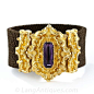 Georgian Mourning Bracelet with Amethyst , c.'1828' : Here is the most beautiful and amazing woven hair bracelet we’ve ever seen. The center plaque and clasp combination highlights a uniquely-cut, elongated octagonal amethyst with a faceted back and a cab
