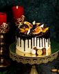 Free photo chocolate drip cake garnished with orange chocolate cookies and waffles