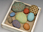 Painted ceramic stones by Daphne Verley  http://www.daphneverley.com/clay/: 