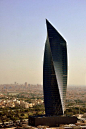 Al Tijaria Tower in Kuwait is a twisted tower with 45 floors and 715 feet tall.