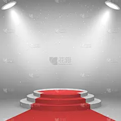 颁奖典礼的舞台。白色讲台上铺着红地毯