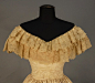 MOIRE SILK WEDDING GOWN, 1855-1860.