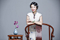 Portrait of young beautiful woman in traditional cheongsam