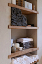 wood shelving. Reminds me of a spa. Would be great in a bathroom: 
