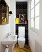 15 Incredible Small Bathroom Decorating Ideas - black subway tiles with white grout, chevron wooden floors, clean white walls + pops of yellow: 