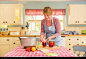 Caucasian woman making jam in kitchen - stock photo