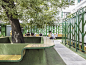 MAT office's courtyard in beijing is fenced by green steel canopy imitating trees