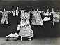 Pet portraits early 20th century...PIC FROM LIBRARY OF CONGRESS / CATERS NEWS - (PICTURED: HANGING UP THE WASHING) - These are the a-MEOW-sing images which show the pet portrait craze dated back as early as the start of the 20th Century. The hilarious pho