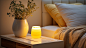 gvnfc_Bed_bedside_table_white_walls_light_yellow_light_night_cl_68c3bea8-7247-42a1-aa79-b1dbc2194626