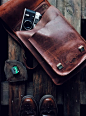 Black and Gray Camera on Brown Leather Bag