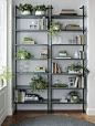 9 Ideas For Creating A Stylish Bookshelf // Greenery --- Plants literally give life to the shelves, and can be a great way to add height and depth to your display. They also help purify the air, making them great for your home environment.