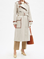 Dockray cotton-canvas and leather trench coat | Burberry : Burberry looks to the street style of London with the tan leather trims and logo print of Burberry’s beige Dockray trench coat — the culture of the British capital has long been a source of inspir