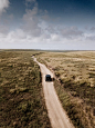 Photo of Vehicle on Dirt Road