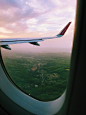 Plane Window Across Bent Plane Wing