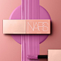 Photo by NARS Cosmetics on May 27, 2023. May be an image of one or more people, makeup, lipstick, cosmetics and text.