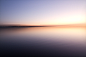 water smooth lake sunset