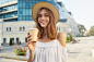 outdoor-portrait-cheerful-attractive-young-woman-wears-stylish-hat-feels-happy-standing-drinking-takeaway-coffee-city-summer