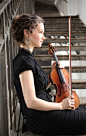Hilary Hahn resting with violin. Photograph by Peter Miller. Hahn, 31, has made her career by straddling core concerto and recit...