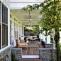 Elegant porch photo in Los Angeles with decking and a roof extension