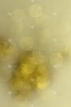 金色闪光的散景背景。