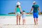 Happy family at tropical beach having fun by Dmitry Travnikov on 500px