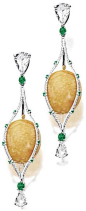 MELO PEARL, DIAMOND AND EMERALD PENDENT EARRINGS.     Each suspending on an oval melo pearl, embraced by an oblong marquise-shaped frame set with brilliant-cut diamonds highlighted by circular-cut emeralds, surmounted and anchored by a pear-shaped rose-cu