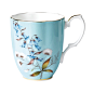 The 1950 Festival Mug is decorated with motifs of typically English flowers such as blue harebells, daffodils and snowdrops, on a pale blue background and framed by rich 9-karat gold trim.