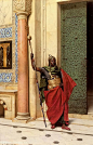The Palace Guard by Ludwig Deutsch, (1900-02), oil on panel, Moorish warrior with battle standard and Indo-Persian armor and weapons. Ludwig Deutsch (Vienna, 1855 - Paris, 1935) was an Austrian painter who settled in Paris. Deutsch came from a well-establ