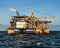 Oil production platform amidst sea Royalty-free stock photo
