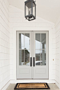 Front Door We changed the exterior color of our home to white shake, and replaced our 7’ solid wood doors with 8’ french doors adorned with big windows that lets the morning light pour into our home #frontdoor