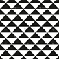 白色背景上黑色三角形的抽象装饰。几何无缝纹理