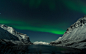 aurora borealis and icy mountain scenery