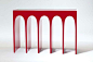 Hervé Van der Straeten’s Passage lacquered-aluminum console mimics the arches in Rome’s Colosseum, 49" w. x 18.7" d. x 33" h.; available to the trade from Ralph Pucci International. ralphpucci.net