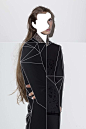 There's like over the image and it's outlining the woman's coat it took the 3 dimension out and replaced it with lines.