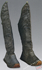 皂靴 
清皇太极
黄条墨书：“太宗文皇帝撒林皮皂靴一双”
高60厘米 长32厘米
清宫旧藏