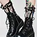 Demonia Devil In Disguise Caged Boots cuz you've got trix up ur sleeves. Get your goth princess on in these platform boots that have a dope strappy ankle design with sikk studz to keep ‘em away.