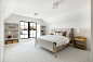 Example of a minimalist bedroom design in Minneapolis