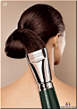 I had to look at this ad a second time. It looks like an ad for a hair coloring product. I like the close zoom on the hair and the brush. I think the hiar has been modified to fit with the product better. It showing what the product can do and it's showin