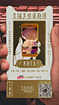 This may contain: a person holding up a card with an image of a cat on it's back